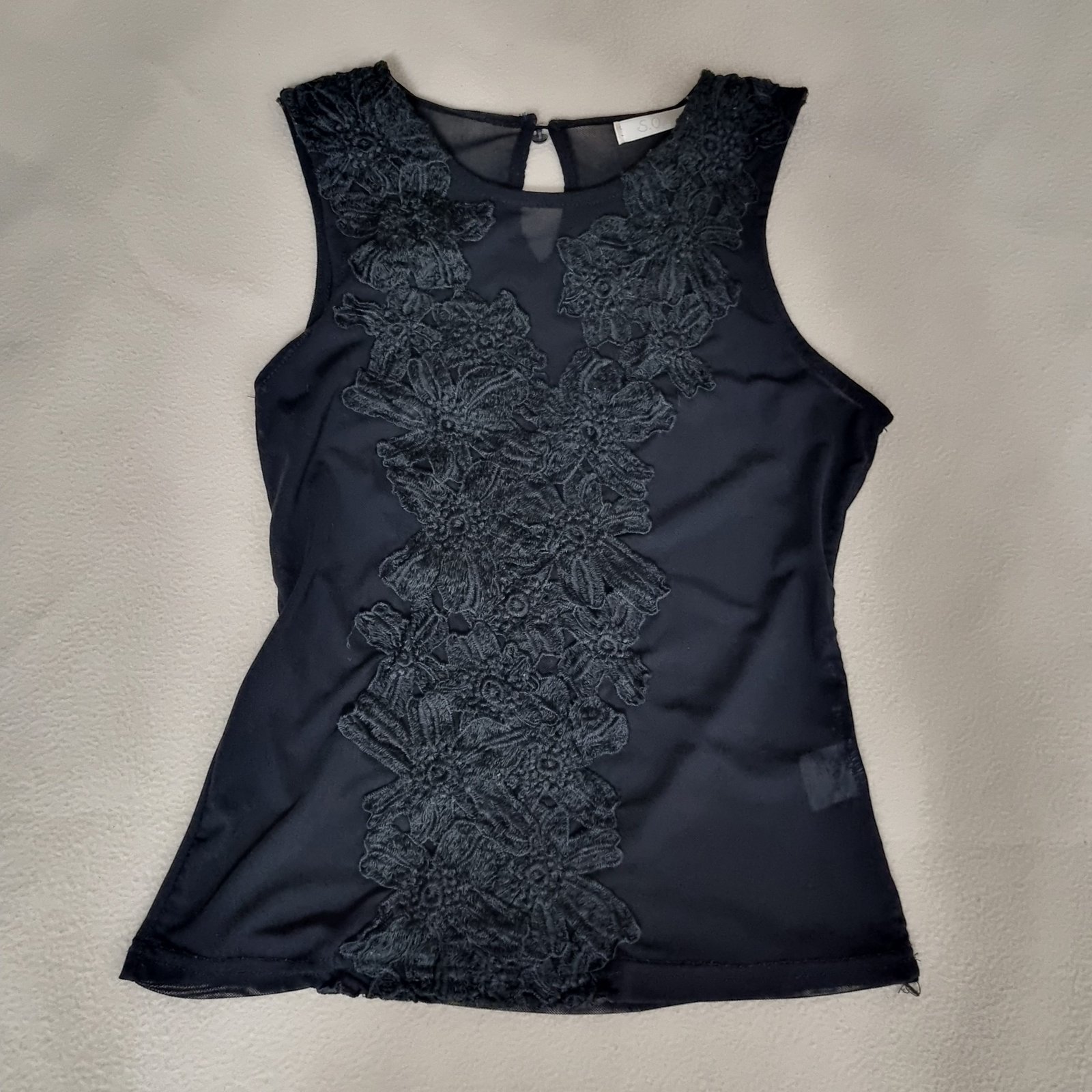 Blusa transparente negra