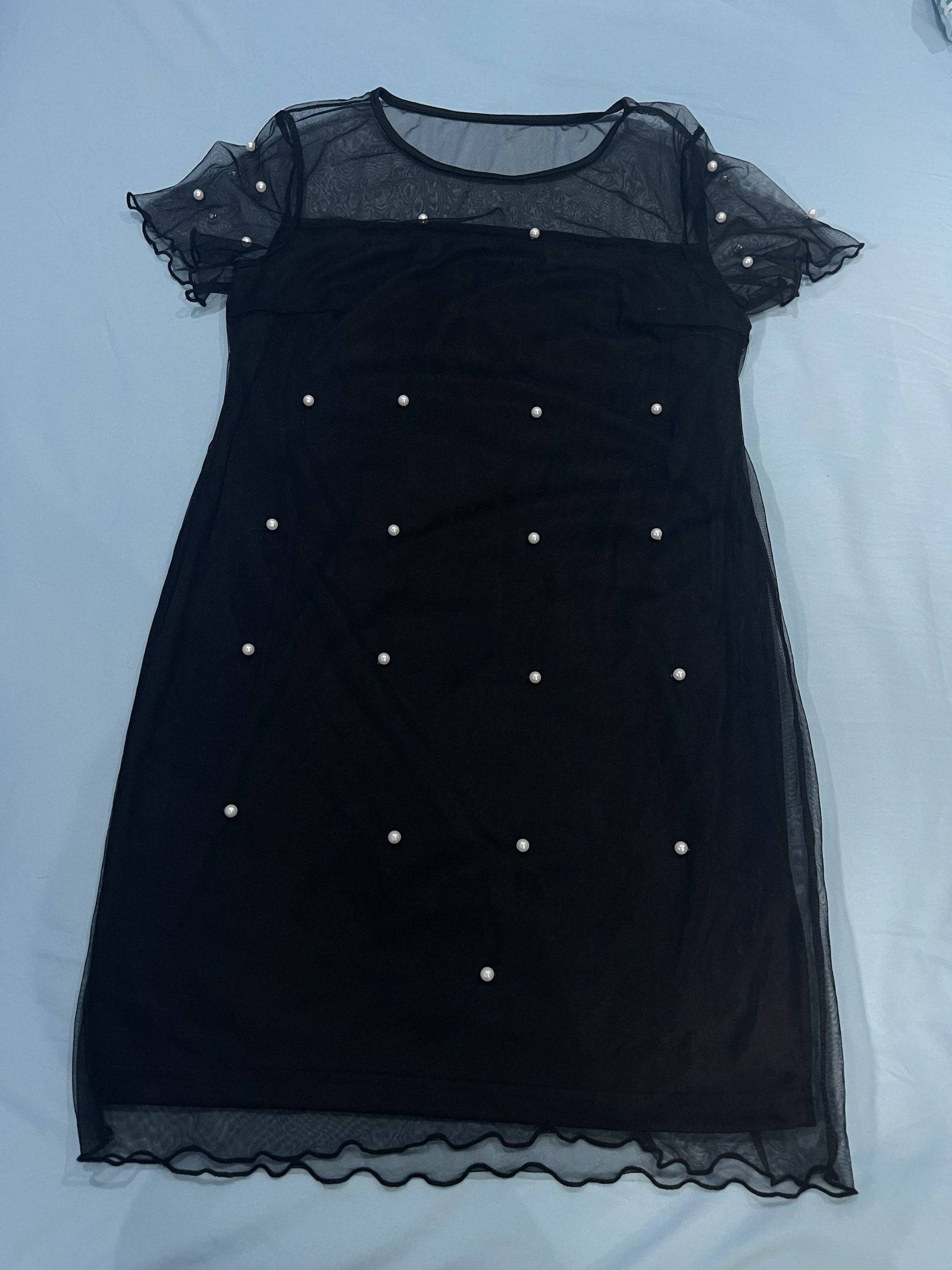 Vestido corto con malla.